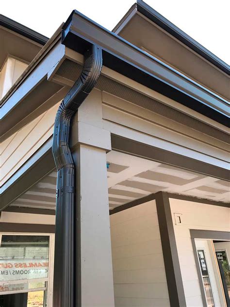 installing gutters on a house with metal roof|metal roof gutters and downspouts.